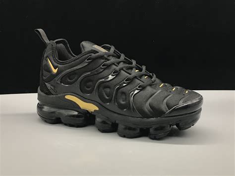 black and gold vapor maxes